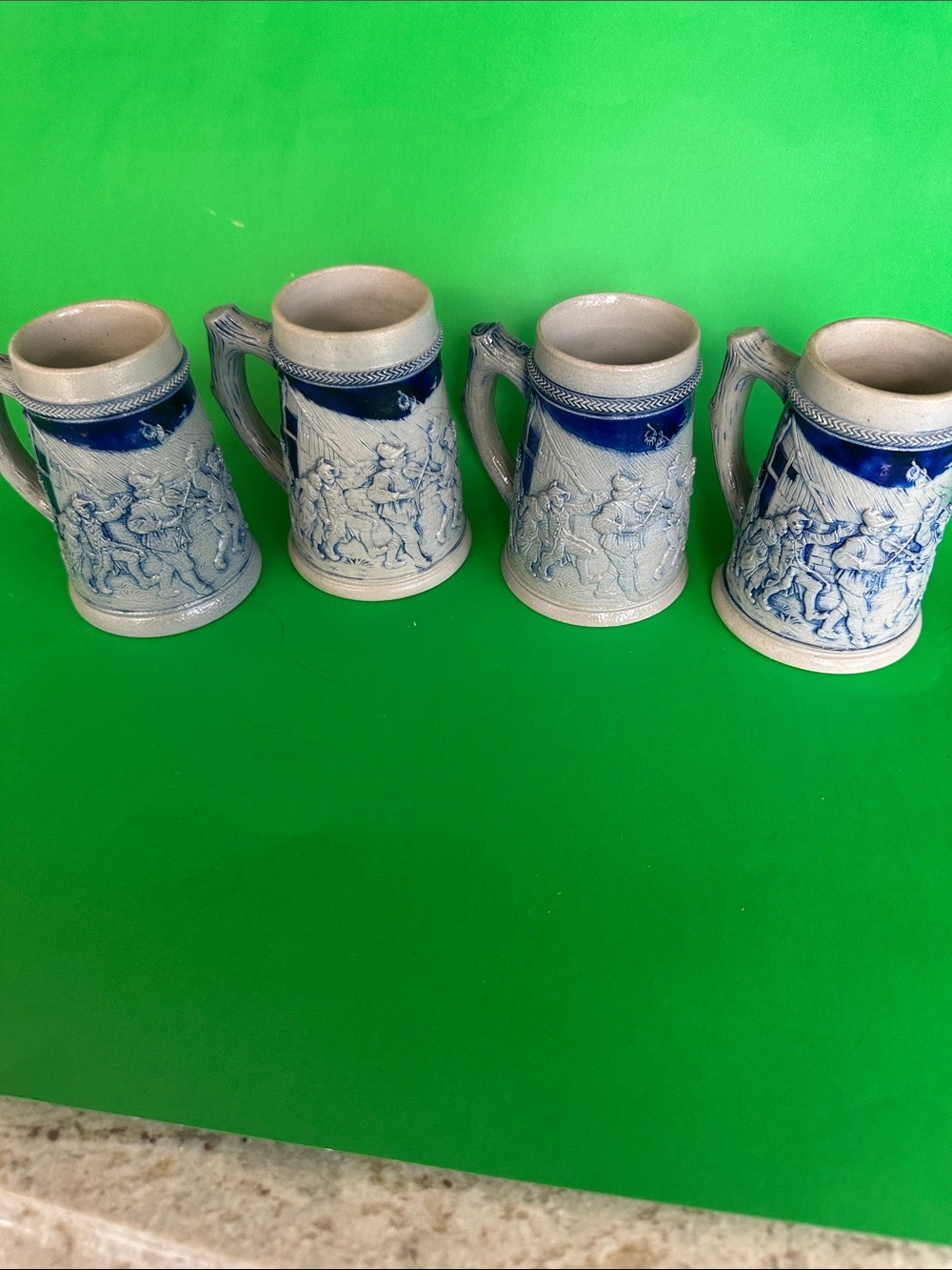 Blue and Cream Relief Ceramic Beer Stein Set - 4 Pack